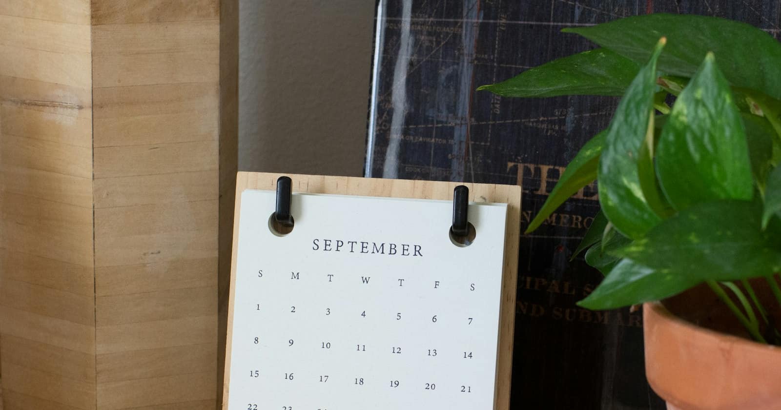 A paper desk calendar and planner