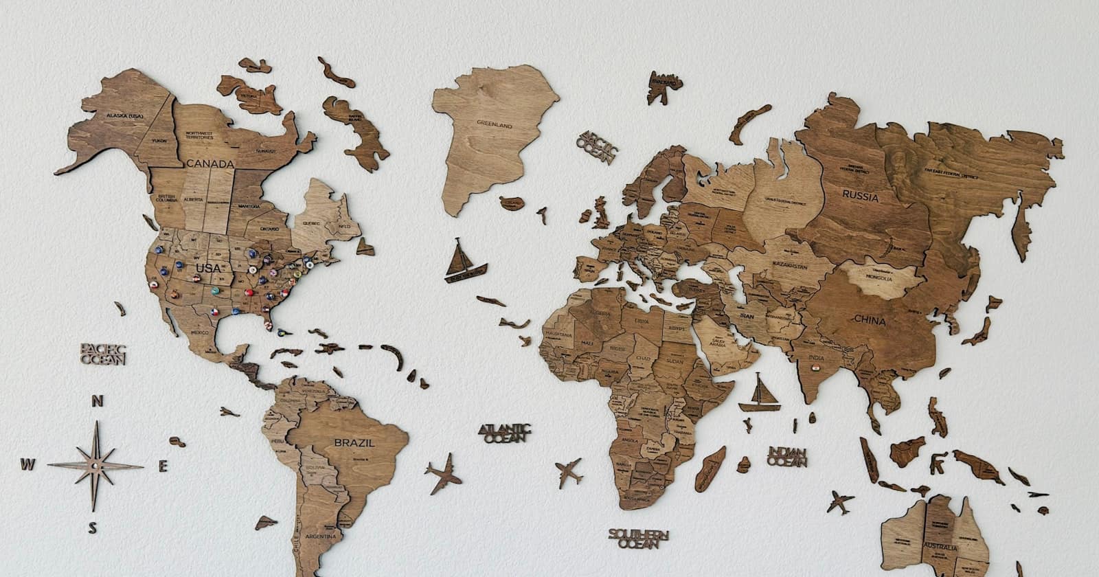 A world map with pins marking several locations