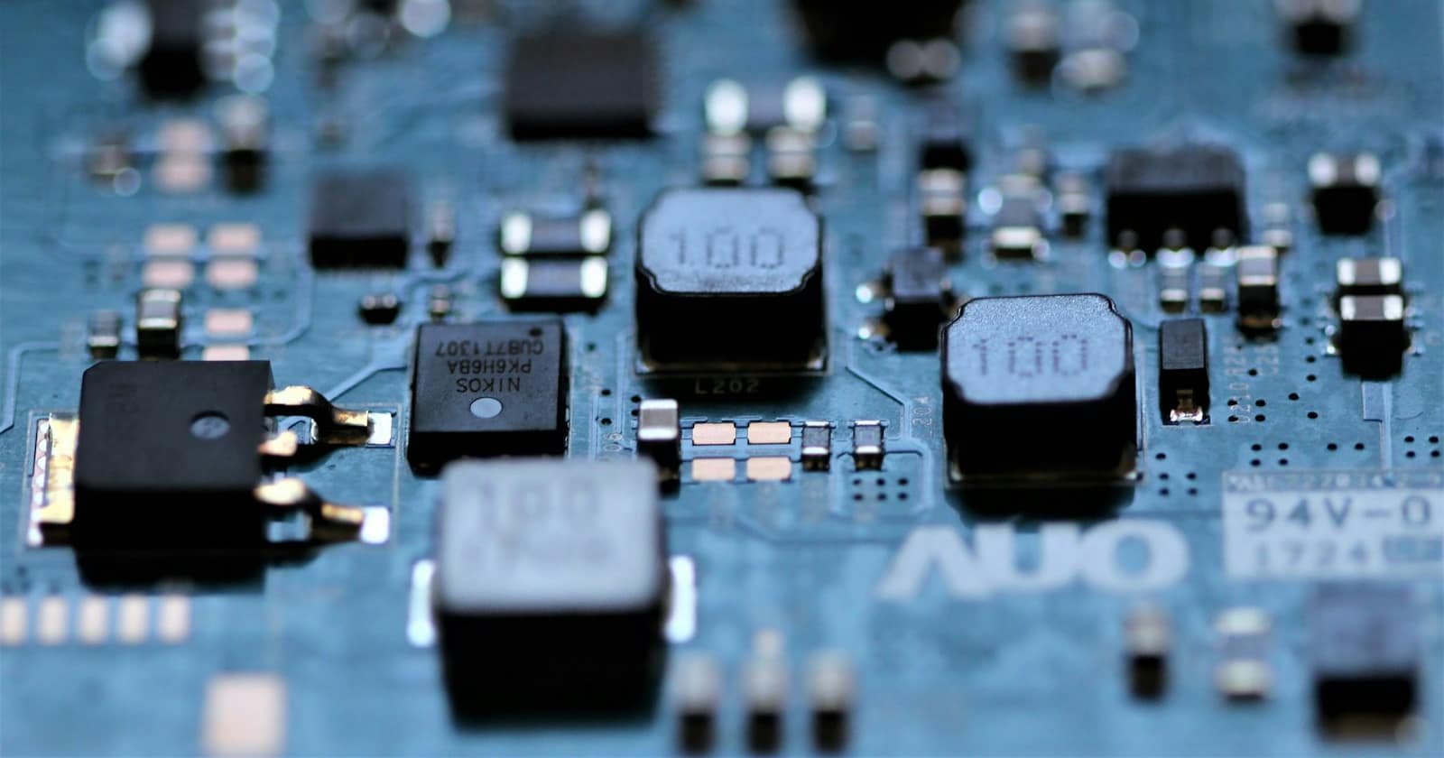A close-up of a circuit board with fine detail