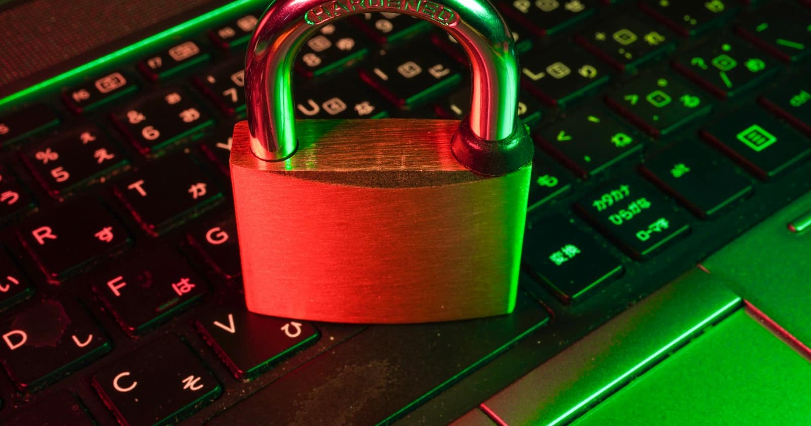 A padlock resting on a laptop keyboard, suggesting secured customer data