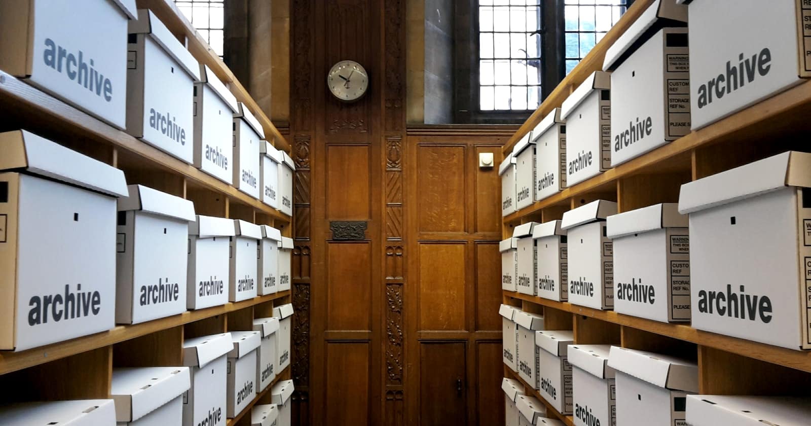 Archive boxes stacked in a storage room
